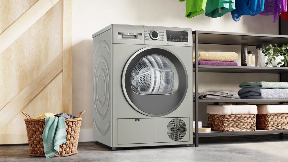 Сушильная машина Bosch Serie 4 WQG1420XME пан.англ. кл.энер.:A макс.загр.:9кг серебристый