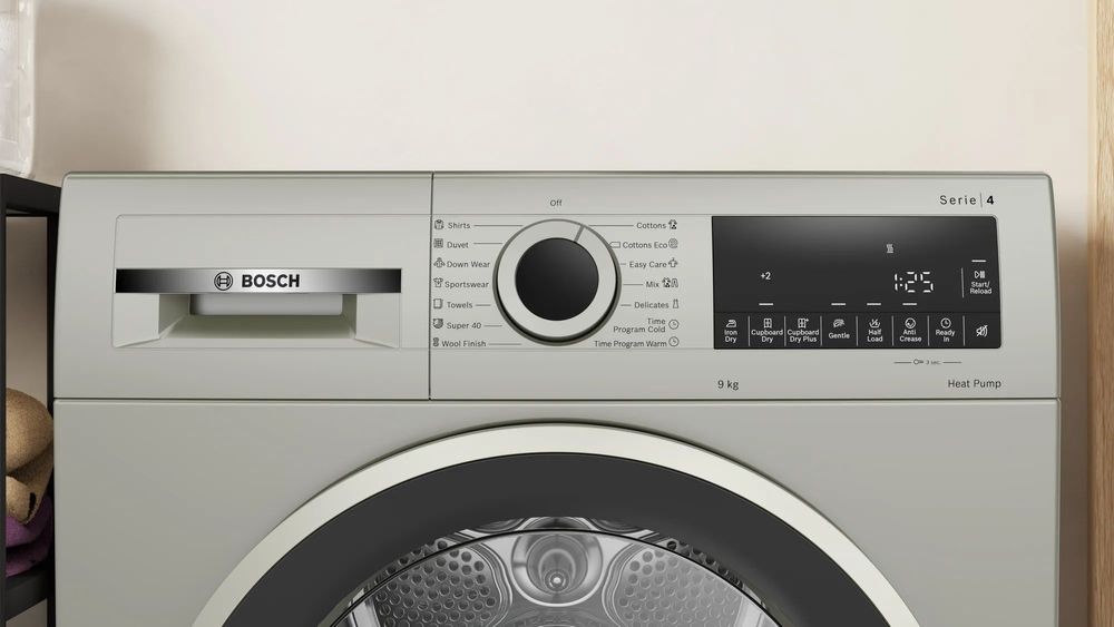 Сушильная машина Bosch Serie 4 WQG1420XME пан.англ. кл.энер.:A макс.загр.:9кг серебристый