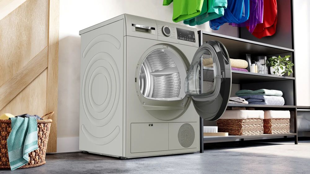 Сушильная машина Bosch Serie 4 WQG1420XME пан.англ. кл.энер.:A макс.загр.:9кг серебристый