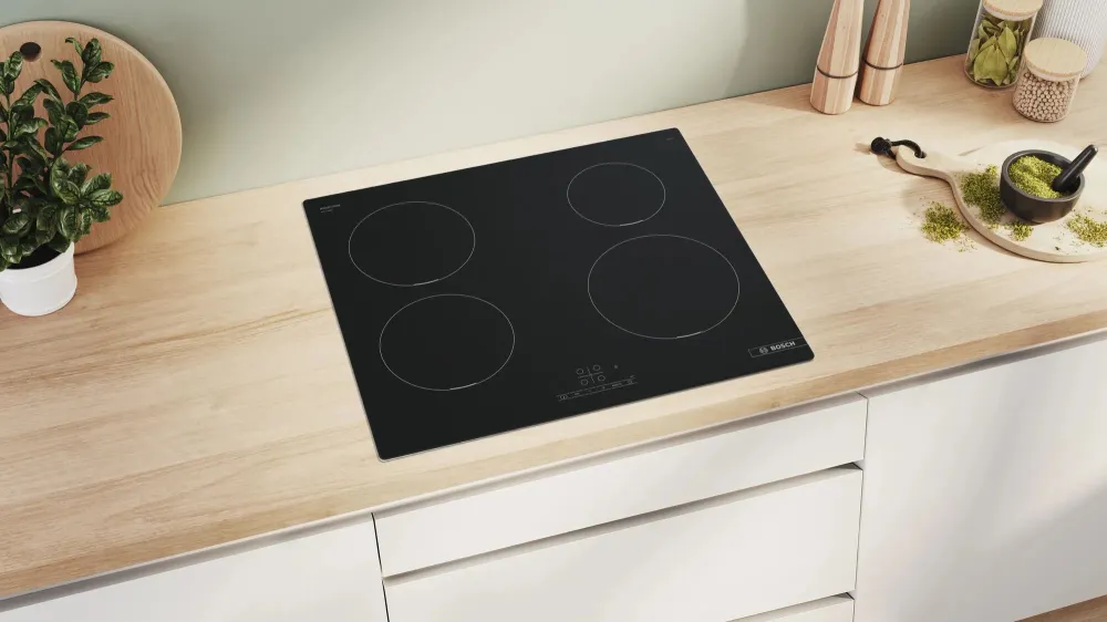 Индукционная варочная поверхность Bosch PUE611BB5D черный